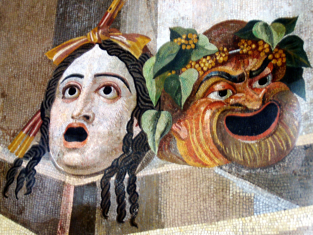 Roman mosaic, 2nd century CE, showing theatrical masks of comedy and tragedy, from the Baths of Decius on the Aventine Hill, Rome. [image by antmoose, CC BY 2.0 (http://creativecommons.org/licenses/by/2.0)], via Wikimedia Commons